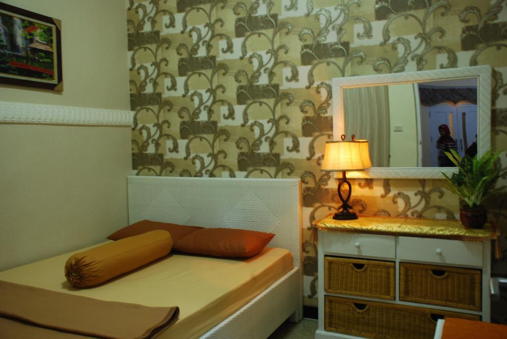 Griya Nelwan Guest House Malang Habitación foto